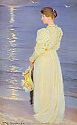 Frau in Weiß am Strand