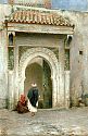 Zwei Orientalen vor dem Tor zu einem Palast im Tanger